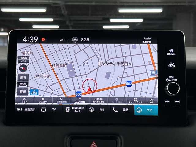 ホンダ ヴェゼル ハイブリッド e:HEV Z 愛知県 2024(令6)年 0.5万km プレミアムサンライトホワイトパール 禁煙車/純正9インチナビ/（AM/FM/Bluetooth/フルセグTV）/バックカメラ/ワイヤレス充電/ホンダセンシング/・衝突軽減ブレーキ/・誤発進抑制機能/・レーンキープアシスト/・オートマチックハイビーム/・追従式クルーズコントロール/コーナーセンサー/ETC2.0/ドライブレコーダー/シートヒーター/ステアリングヒーター/電動リアゲート/パドルシフト/ダウンヒルアシスト/LEDヘッドライト/スマートキー/純正アルミホイール