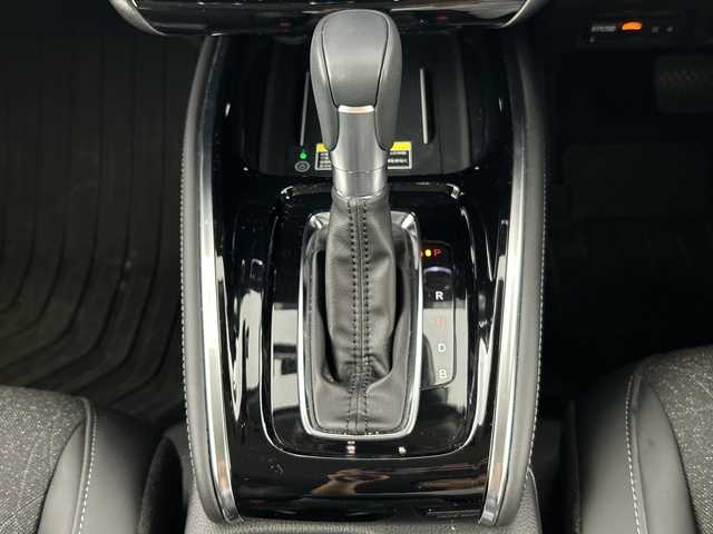 ホンダ ヴェゼル ハイブリッド e:HEV Z 愛知県 2024(令6)年 0.5万km プレミアムサンライトホワイトパール 禁煙車/純正9インチナビ/（AM/FM/Bluetooth/フルセグTV）/バックカメラ/ワイヤレス充電/ホンダセンシング/・衝突軽減ブレーキ/・誤発進抑制機能/・レーンキープアシスト/・オートマチックハイビーム/・追従式クルーズコントロール/コーナーセンサー/ETC2.0/ドライブレコーダー/シートヒーター/ステアリングヒーター/電動リアゲート/パドルシフト/ダウンヒルアシスト/LEDヘッドライト/スマートキー/純正アルミホイール