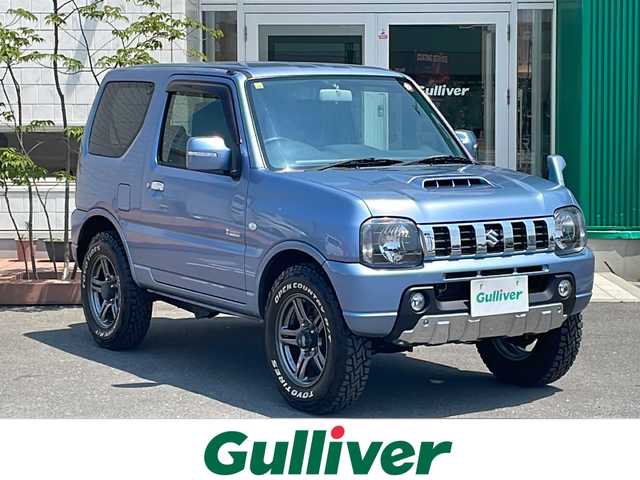 スズキ ジムニー クロスアドベンチャー 青森県 2012(平24)年 6.5万km ブリーズブルーメタリック 4WD/ワンオーナー/5速マニュアル車/社外オーディオ/BT/AUX/専用合皮シート/運転席シートヒーター/背面タイヤハードカバー/フォグランプ/電動格納ミラー/ドアバイザー/Wエアバック/純正フロアマット/リモコンキー/純正16インチAW夏タイヤ/社外16インチAWスタッドレスタイヤ有/保証書・取説書