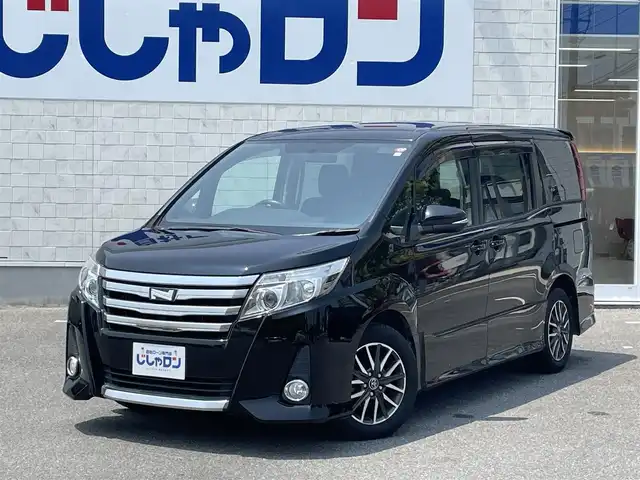 トヨタ ノア Si 佐賀県 2014(平26)年 10.7万km ブラック こちらは現金またはオートローンご利用時の価格です。/自社ローンご希望の方は別途その旨お申付け下さい/・202ブラック/・８人乗り　/・両側電動スライドドア　/・純正ＨＤＤナビ/フルセグ/ＢＴオーディオ/ＤＶＤ/ＣＤ　/・バックカメラ　/・ビルトインＥＴＣ