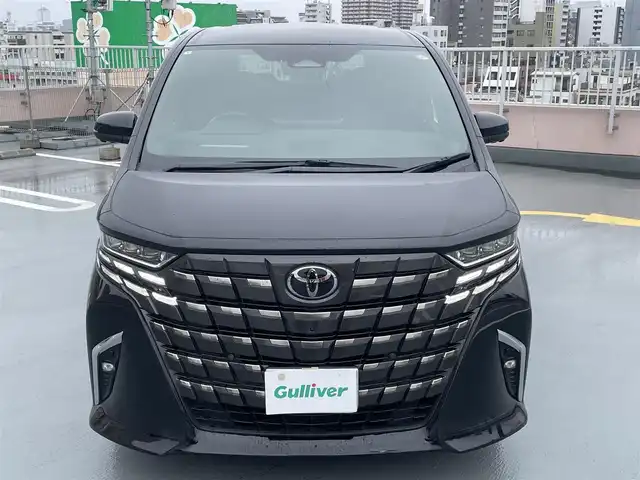 トヨタ アルファードハイブリット Z 東京都 2024(令6)年 1.8万km ブラック 法人ワンオーナー/左右独立ムーンルーフ/黒皮シート/トヨタセーフティセンス/PCS//PDA/BSM/LDA/レーンチェンジアシスト/レーダークルーズコントロール/純正コネクティドナビ/Bluetooth/フルセグTV/純正後席１３．２型モニター（V13T-R72F)/全周囲カメラ/D/Nシートヒーター・エアシート・ヒーテッドミラー/ステアリングヒーター/D/Nパワーシート/両側パワースライドドア/純正１８インチアルミ/ETC2.0/前後TZドライブレコーダー（TZ-DR212)/ドアエッジプロテクター/ワイヤレス充電/純正フロアマット/エンジンプッシュボタン/スマートキー/スペアキー１本/保証書・取説