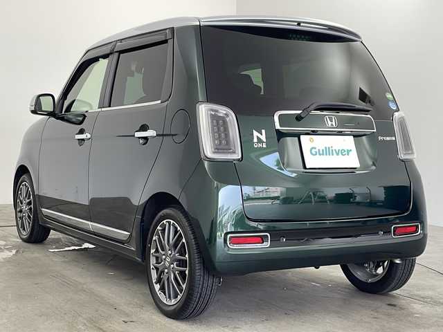 ホンダ Ｎ ＯＮＥ プレミアム ツアラー 兵庫県 2020(令2)年 0.8万km ブリティッシュグリーンP ホンダセンシング/・衝突軽減ブレーキ/・歩行者事故低減ステアリング/・先行車発進お知らせ機能/・標識認識機能/・アダプティブクルーズコントロール/・車線維持支援システム/・オートハイビーム/・誤発進抑制機能/ロ阿木逸脱抑制機能/・後方誤発進抑制機能/純正7インチSDナビ/・Bluetooth/・CD/・DVD/・フルセグテレビ/・バックカメラ/パーキングセンサーシステム/ビルドインETC/ハーフレザーシート/・シートヒーター（D席＋N席）/クリアランスソナー/純正15インチアルミホイール/LEDヘッドライト/オートライト/新車保証書/取扱説明書