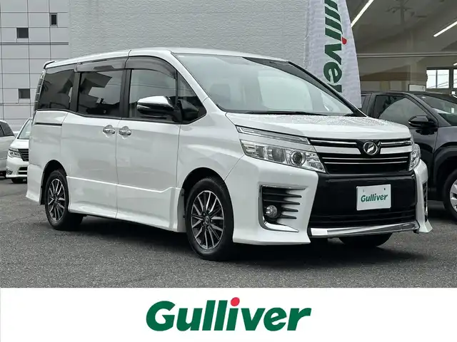 トヨタ ヴォクシー ZS 煌 愛知県 2015(平27)年 9.3万km ホワイトパールクリスタルシャイン ワンオーナー/純正ナビ/バックカメラ/フルセグＴＶ/DVD再生/ETC/Bluetooth/両側パワステスライド/フォグランプ/T-Connect/取扱説明書/保証書/記録簿