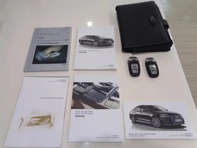 アウディ Ａ６ 2．0 TFSI クワトロ 鹿児島県 2016(平28)年 7.8万km グレイシアホワイトメタリック コンフォートシートパッケージ、バルコナレザー/前席温冷シート、シートベンチレーション/BOSEスピーカー/リアコンフォートプラスパッケージ/4席独立温度調整オートエアコン/後席左右シートヒーター/リア電動サンブラインド/アダプティブクルーズコントロール/純正ナビ、フルセグTV、DVD、CD/ブルートゥース、USB/バックカメラ/純正OPウォールナット調パネル/ビルトインETC2.0/取説、MMI取説、保証書/スマートキー2個あり/車検令和9年10月まであり