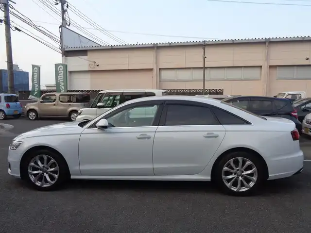 アウディ Ａ６ 2．0 TFSI クワトロ 鹿児島県 2016(平28)年 7.8万km グレイシアホワイトメタリック コンフォートシートパッケージ、バルコナレザー/前席温冷シート、シートベンチレーション/BOSEスピーカー/リアコンフォートプラスパッケージ/4席独立温度調整オートエアコン/後席左右シートヒーター/リア電動サンブラインド/アダプティブクルーズコントロール/純正ナビ、フルセグTV、DVD、CD/ブルートゥース、USB/バックカメラ/純正OPウォールナット調パネル/ビルトインETC2.0/取説、MMI取説、保証書/スマートキー2個あり/車検令和9年10月まであり