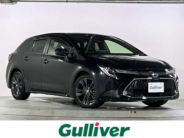 トヨタ カローラツーリング ハイブリッド ダブルバイビー 広島県 2020(令2)年 4.9万km ブラックマイカ 禁煙車/トヨタセーフティセンス/・プリクラッシュセーフティ/・LDA/LTA/・RSA/・オートマチックハイビーム/・レーダークルーズコントロール/・先行車発進お知らせ/BSM/RCTA/クリアランスソナー/純正ディスプレイオーディオ/・ナビ/Bluetooth/USB/Miracast/バックカメラ/革巻きステアリング/ステアリングスイッチ/ステアリングヒーター/オートライト/ハーフレザーシート/シートヒーター/LEDヘッドライト/フォグランプ/電動パーキングブレーキ/オートホールド/スマートキー/プッシュスタート/スペアキー/ドアバイザー/ワイヤレス充電/ETC/純正フロアマット/純正１７インチアルミホイール