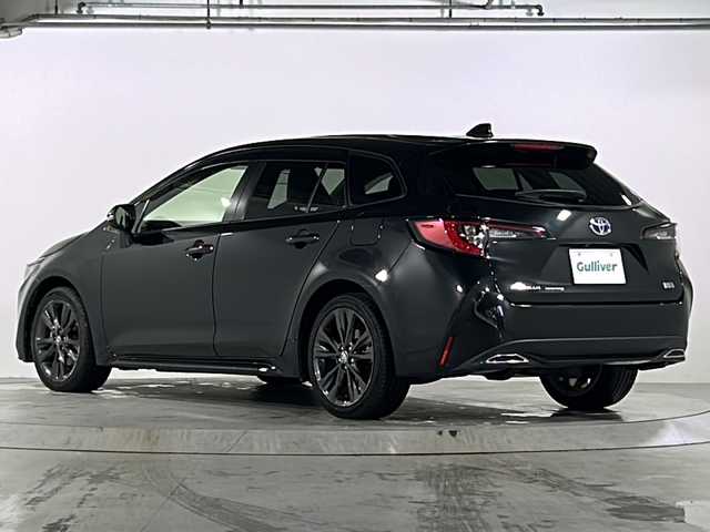 トヨタ カローラツーリング ハイブリッド ダブルバイビー 広島県 2020(令2)年 4.9万km ブラックマイカ 禁煙車/トヨタセーフティセンス/・プリクラッシュセーフティ/・LDA/LTA/・RSA/・オートマチックハイビーム/・レーダークルーズコントロール/・先行車発進お知らせ/BSM/RCTA/クリアランスソナー/純正ディスプレイオーディオ/・ナビ/Bluetooth/USB/Miracast/バックカメラ/革巻きステアリング/ステアリングスイッチ/ステアリングヒーター/オートライト/ハーフレザーシート/シートヒーター/LEDヘッドライト/フォグランプ/電動パーキングブレーキ/オートホールド/スマートキー/プッシュスタート/スペアキー/ドアバイザー/ワイヤレス充電/ETC/純正フロアマット/純正１７インチアルミホイール