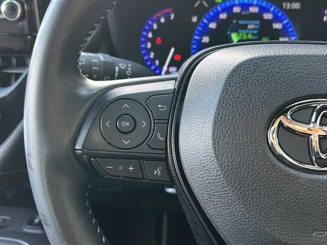 トヨタ カローラツーリング ハイブリッド ダブルバイビー 広島県 2020(令2)年 4.9万km ブラックマイカ 禁煙車/トヨタセーフティセンス/・プリクラッシュセーフティ/・LDA/LTA/・RSA/・オートマチックハイビーム/・レーダークルーズコントロール/・先行車発進お知らせ/BSM/RCTA/クリアランスソナー/純正ディスプレイオーディオ/・ナビ/Bluetooth/USB/Miracast/バックカメラ/革巻きステアリング/ステアリングスイッチ/ステアリングヒーター/オートライト/ハーフレザーシート/シートヒーター/LEDヘッドライト/フォグランプ/電動パーキングブレーキ/オートホールド/スマートキー/プッシュスタート/スペアキー/ドアバイザー/ワイヤレス充電/ETC/純正フロアマット/純正１７インチアルミホイール