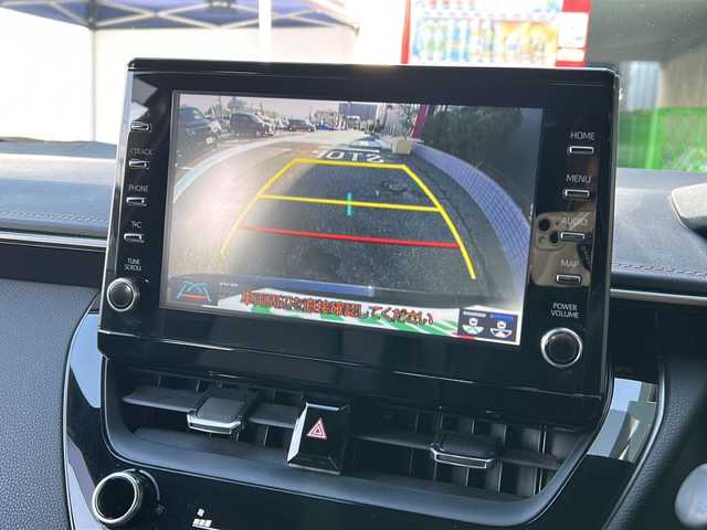 トヨタ カローラツーリング ハイブリッド ダブルバイビー 広島県 2020(令2)年 4.9万km ブラックマイカ 禁煙車/トヨタセーフティセンス/・プリクラッシュセーフティ/・LDA/LTA/・RSA/・オートマチックハイビーム/・レーダークルーズコントロール/・先行車発進お知らせ/BSM/RCTA/クリアランスソナー/純正ディスプレイオーディオ/・ナビ/Bluetooth/USB/Miracast/バックカメラ/革巻きステアリング/ステアリングスイッチ/ステアリングヒーター/オートライト/ハーフレザーシート/シートヒーター/LEDヘッドライト/フォグランプ/電動パーキングブレーキ/オートホールド/スマートキー/プッシュスタート/スペアキー/ドアバイザー/ワイヤレス充電/ETC/純正フロアマット/純正１７インチアルミホイール