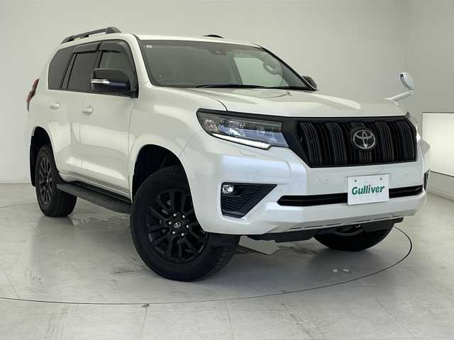 トヨタ ランドクルーザー プラド TX Lパッケージ マットブラED 広島県 2023(令5)年 1.1万km ホワイトパールクリスタルシャイン 禁煙車/トヨタセーフティセンス/プリクラッシュブレーキ/レーンアシスト/オートハイビーム/アダプティブクルーズコントロール　/ダウンヒルアシストコントロール/純正９インチナビ　/CD/DVD/SD/BT/フルセグTV/バックカメラ　/パワーシート　/シートヒーター　/エアシート　/本革シート　/ビルトインＥＴＣ　/ドライブレコーダー　/ＬＥＤオートライト　/プッシュスタート/スマートキー/純正18インチアルミ