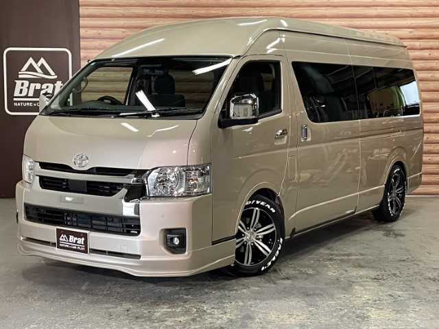 トヨタ ハイエース ファインテックツアラー 道北・旭川 2025(令7)年 0.1万km未満 ベージュM AIS検査済み/【2503036777】/4WD(フル）/MTモード付/禁煙車/登録済み未使用車/寒冷地仕様車/フロントフォグランプ/LEDヘッドライト/オートライト/片側パワスラ/純正フロアマット/ウォークスルー/スマートキー/AC100v電源/オットマン/Wエアコン/AAC/障害物センサー/盗難防止装置/オートマチックハイビーム/レーンキープアシスト/横滑り防止/衝突被害軽減ブレーキ/17AW 415コブラ  バッドラッカーI(社外）/グッドイヤー　イーグル#1　ナスカープラス（社外）/1インチローダウンキット（社外）/玄武　レゾネーターキャンセラー（社外）/415コブラ クリーンルック3 タイプR フロントスポイラー（社外）/ガッツミラーレスカバー（社外）/ESSEX　リーガルフェンダー（社外）/黒木目マホガニーインテリアセット（社外）/・インテリアパネル/・ステアリング/・シフトノブ/BratオリジナルUSBソケット（社外）/社外パーツ取付済み