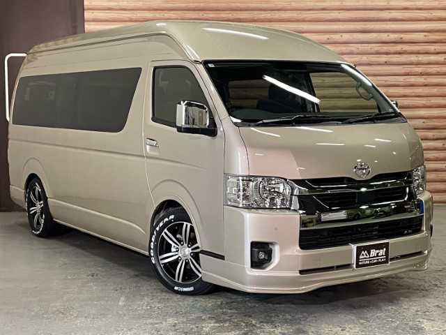 トヨタ ハイエース ファインテックツアラー 道北・旭川 2025(令7)年 0.1万km未満 ベージュM AIS検査済み/【2503036777】/4WD(フル）/MTモード付/禁煙車/登録済み未使用車/寒冷地仕様車/フロントフォグランプ/LEDヘッドライト/オートライト/片側パワスラ/純正フロアマット/ウォークスルー/スマートキー/AC100v電源/オットマン/Wエアコン/AAC/障害物センサー/盗難防止装置/オートマチックハイビーム/レーンキープアシスト/横滑り防止/衝突被害軽減ブレーキ/17AW 415コブラ  バッドラッカーI(社外）/グッドイヤー　イーグル#1　ナスカープラス（社外）/1インチローダウンキット（社外）/玄武　レゾネーターキャンセラー（社外）/415コブラ クリーンルック3 タイプR フロントスポイラー（社外）/ガッツミラーレスカバー（社外）/ESSEX　リーガルフェンダー（社外）/黒木目マホガニーインテリアセット（社外）/・インテリアパネル/・ステアリング/・シフトノブ/BratオリジナルUSBソケット（社外）/社外パーツ取付済み