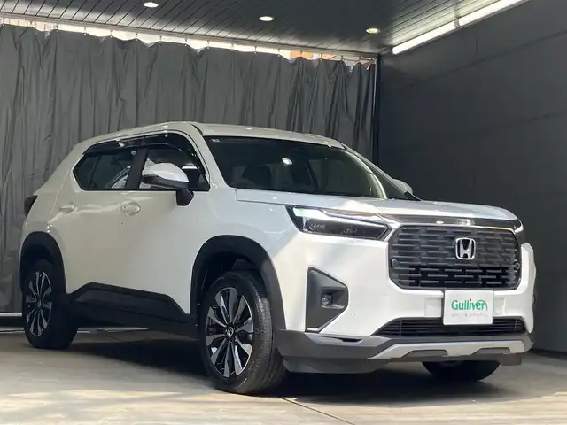 ホンダ ＷＲ－Ｖ Z 東京都 2025(令7)年 0.7万km プラチナホワイトパール ホンダセンシング/●衝突軽減ブレーキ（CMBS）/●先行車発進お知らせ機能/●歩行者事故低減ステアリング/●路外逸脱抑制機能●標識認識機能/●アダプティブクルーズコントロール（ACC）/●車線維持支援システム（LKAS）/●誤発進抑制機能/●後方誤発進抑制機能/●近距離衝突軽減ブレーキ/●急アクセル抑制機能/●パーキングセンサーシステム/●オートハイビーム/純正8インチナビ/バックカメラ/Bluetooth/フルセグテレビ/パドルシフト/スマートキー/コーナーセンサー /ビルトインETC/LEDヘッドライト　フォグランプ/USB端子/ドライブレコーダー前後/ステリングリモコン/ウィンカーミラー/保証書・取扱説明書・スペアキー