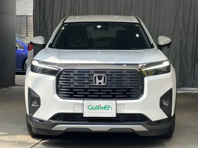 ホンダ ＷＲ－Ｖ Z 東京都 2025(令7)年 0.7万km プラチナホワイトパール ホンダセンシング/●衝突軽減ブレーキ（CMBS）/●先行車発進お知らせ機能/●歩行者事故低減ステアリング/●路外逸脱抑制機能●標識認識機能/●アダプティブクルーズコントロール（ACC）/●車線維持支援システム（LKAS）/●誤発進抑制機能/●後方誤発進抑制機能/●近距離衝突軽減ブレーキ/●急アクセル抑制機能/●パーキングセンサーシステム/●オートハイビーム/純正8インチナビ/バックカメラ/Bluetooth/フルセグテレビ/パドルシフト/スマートキー/コーナーセンサー /ビルトインETC/LEDヘッドライト　フォグランプ/USB端子/ドライブレコーダー前後/ステリングリモコン/ウィンカーミラー/保証書・取扱説明書・スペアキー