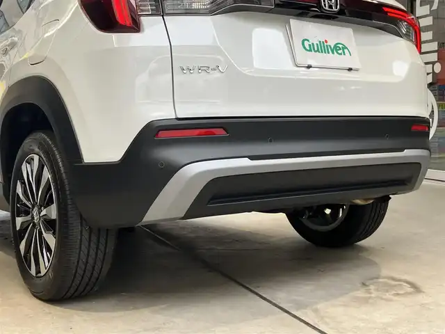 ホンダ ＷＲ－Ｖ Z 東京都 2025(令7)年 0.7万km プラチナホワイトパール ホンダセンシング/●衝突軽減ブレーキ（CMBS）/●先行車発進お知らせ機能/●歩行者事故低減ステアリング/●路外逸脱抑制機能●標識認識機能/●アダプティブクルーズコントロール（ACC）/●車線維持支援システム（LKAS）/●誤発進抑制機能/●後方誤発進抑制機能/●近距離衝突軽減ブレーキ/●急アクセル抑制機能/●パーキングセンサーシステム/●オートハイビーム/純正8インチナビ/バックカメラ/Bluetooth/フルセグテレビ/パドルシフト/スマートキー/コーナーセンサー /ビルトインETC/LEDヘッドライト　フォグランプ/USB端子/ドライブレコーダー前後/ステリングリモコン/ウィンカーミラー/保証書・取扱説明書・スペアキー