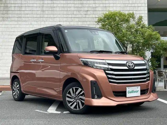 トヨタ ルーミー カスタムG 愛媛県 2021(令3)年 2.2万km ブラックマイカメタリック/ブリリアントカッパークリスタルマイカ 2トーン 純正ナビ/・Bluetooth/・CD/DVD/フルセグTV/全方位カメラ/両側パワースライドドア/ETC/衝突軽減ブレーキ/レーダークルーズコントロール/前後クリアランスソナー/オートライト/オートマチックハイビーム/ＬＥＤヘッドライト/プッシュスタート/スマートキー/スペアキー/純正14インチAW/純正フロアマット