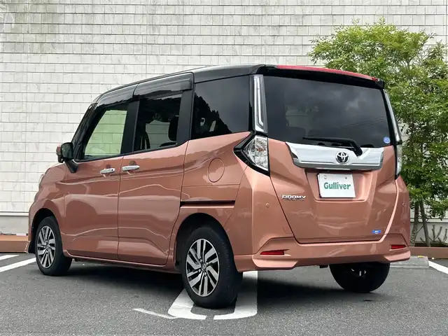トヨタ ルーミー カスタムG 愛媛県 2021(令3)年 2.2万km ブラックマイカメタリック/ブリリアントカッパークリスタルマイカ 2トーン 純正ナビ/・Bluetooth/・CD/DVD/フルセグTV/全方位カメラ/両側パワースライドドア/ETC/衝突軽減ブレーキ/レーダークルーズコントロール/前後クリアランスソナー/オートライト/オートマチックハイビーム/ＬＥＤヘッドライト/プッシュスタート/スマートキー/スペアキー/純正14インチAW/純正フロアマット