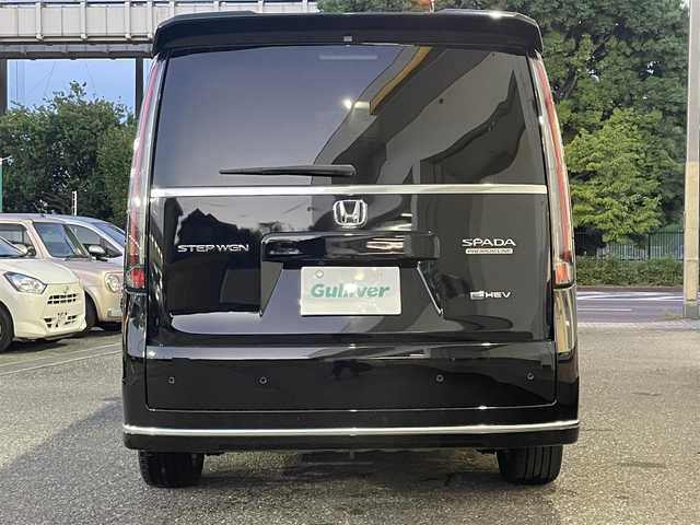 ホンダ ステップワゴン スパーダ eHEV プレミアムライン 千葉県 2022(令4)年 1.7万km クリスタルブラックパール 純正11.4インチHonda CONNECTナビ/(CD/DVD/BT/フルセグTV/HDMI)/純正15.6インチ後席モニター/全方位カメラ/衝突被害軽減システム/レーンキープアシスト/両側パワースライドドア/電動リアゲート/レーダークルーズコントロール/パドルシフト/電子パーキングブレーキ/オートホールドスイッチ/ブラインドスポットモニター/ハーフレザーシート/シートヒーター(前席、2列目)/リアサンシェード/リアオートエアコン/オットマン/ビルドインETC/LEDヘッドライト/オートライト/純正前後ドライブレコーダー/ドアバイザー/純正フロアマット/純正17インチAW/スペアキー/取扱説明書/新車時保証書