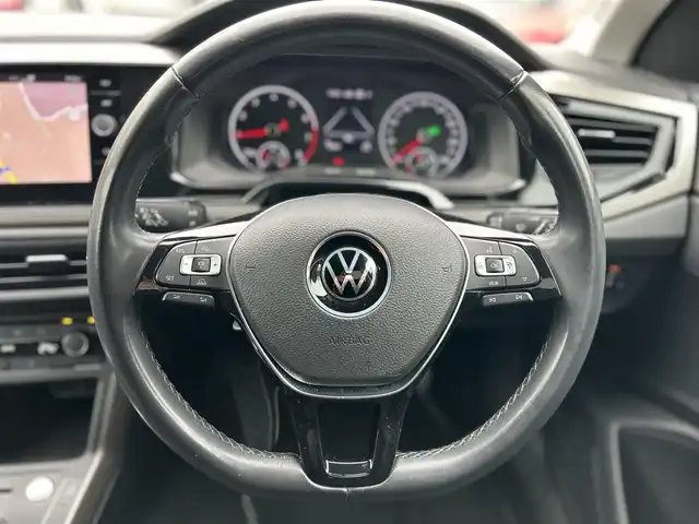 フォルクスワーゲン ポロ TSIコンフォートライン 東京都 2021(令3)年 1.8万km リーフブルーメタリック ワンオーナー/R4/R5/R6年分ディーラー整備記録簿あり/8インチタッチスクリーン/SSDナビ／Bluetoothオーディオ／バックカメラ/セーフティパッケージ/・アダプティブクルーズ/・レーンキープアシスト/・ブラインドスポット/・パークディスタンスコントロール/LEDヘッドランプ/ETC2.0/ドライブレコーダー/純正フロアマット/純正15インチアルミホイール/スマートエントリー／スタートシステム