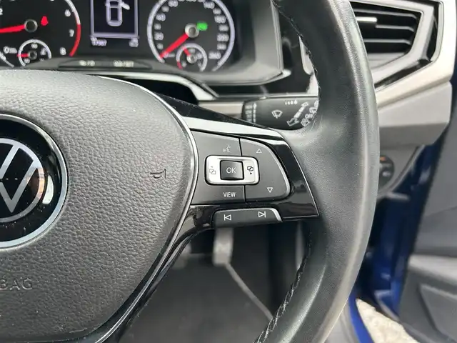 フォルクスワーゲン ポロ TSIコンフォートライン 東京都 2021(令3)年 1.8万km リーフブルーメタリック ワンオーナー/R4/R5/R6年分ディーラー整備記録簿あり/8インチタッチスクリーン/SSDナビ／Bluetoothオーディオ／バックカメラ/セーフティパッケージ/・アダプティブクルーズ/・レーンキープアシスト/・ブラインドスポット/・パークディスタンスコントロール/LEDヘッドランプ/ETC2.0/ドライブレコーダー/純正フロアマット/純正15インチアルミホイール/スマートエントリー／スタートシステム