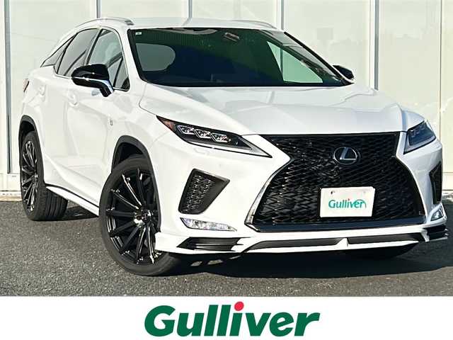レクサス ＲＸ 300 Fスポーツ 福岡県 2019(令1)年 2.9万km ホワイトノーヴァガラスフレーク 純正12.3インチナビ/（AM/FM/CD/DVD/SD/USB/BT/AUX/フルセグ）/レーダークルーズコントロール/前後コーナーセンサー/レーンキープアシスト/衝突軽減ブレーキ/ロードサインアシスト/ヘッドアップディスプレイ/レーントレーシングアシスト/ブラインドスポットモニター/ETC2.0/バック+サイドカメラ/電動リアゲート/前後ドライブレコーダー/オートライト/オートハイビーム/LEDヘッドライト/フォグランプ/電動パーキングブレーキ/オートホールド/置くだけ充電/社外レーダー/ヒートステアリング/レザーシート/D+N席パワーシート/D+N席シートヒーター/エアシート/D席メモリーシート/純正22インチアルミホイール/パドルシフト/エアロ（F/S/R）/純正フロアマット/100V電源/後席サンシェード/カードキー付き/保証書・記録簿