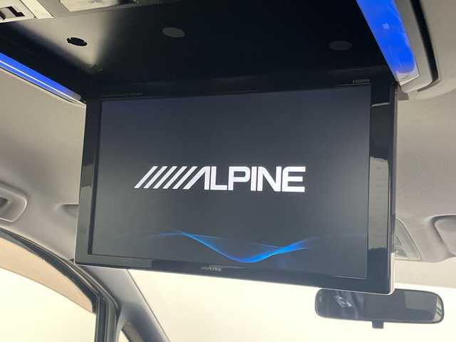 トヨタ ヴォクシー ZS 煌 愛媛県 2015(平27)年 11.4万km ブラック ALPINE10型ナビ/フルセグ　Bluetooth DVD再生可/ALPINE後席フリップダウンモニター/クルーズコントロール//ワンタッチスイッチ付パワースライドドア（両側）/LEDフロントフォグランプ/LEDクリアランスランプ（メッキエクステンション）/LEDルームランプ（フロントパーソナル・センター・リヤ）/フードモール（中央：メッキ、上:ブラック、下：メッキ）/レザー調シートカバー/Toyota Safety Sense C/（・プリクラッシュセーフティシステム/ （レーザーレーダー＋単眼カメラ方式）/・レーンディパーチャーアラート/・オートマチックハイビーム）/専用エアロパーツ（フロント大型バンパー［メッキ加飾付］/＋フロントフェンダー＋リヤ大型バンパー＋リヤスポイラー＋大型サイドマッドガード