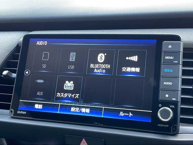 ホンダ フィット e:HEVネス 山口県 2020(令2)年 1.7万km ミッドナイトブルービームM 純正９インチSDナビ/　AM/FM/SD/Bluetooth/フルセグテレビ/ビルトインETC/前後ドライブレコーダー/バックカメラ/プッシュスタート/アイドリングストップ/電動パーキングブレーキ/オートマチックハイビーム/純正LEDヘッドライト/純正16インチアルミホイール/コーナーセンサー/ホンダセンシング/　衝突軽減ブレーキ/　先行者発進お知らせ機能/　路外逸脱抑制機能/　追従機能付きアダプティブクルーズコントロール/　車線維持支援システム/USB端子/ドアバイザー/純正フロアマット/電動格納ウィンカーミラー/　