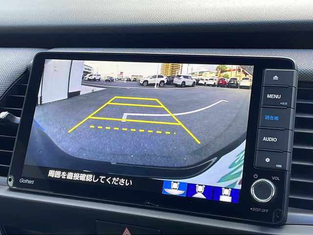 ホンダ フィット e:HEVネス 山口県 2020(令2)年 1.7万km ミッドナイトブルービームM 純正９インチSDナビ/　AM/FM/SD/Bluetooth/フルセグテレビ/ビルトインETC/前後ドライブレコーダー/バックカメラ/プッシュスタート/アイドリングストップ/電動パーキングブレーキ/オートマチックハイビーム/純正LEDヘッドライト/純正16インチアルミホイール/コーナーセンサー/ホンダセンシング/　衝突軽減ブレーキ/　先行者発進お知らせ機能/　路外逸脱抑制機能/　追従機能付きアダプティブクルーズコントロール/　車線維持支援システム/USB端子/ドアバイザー/純正フロアマット/電動格納ウィンカーミラー/　