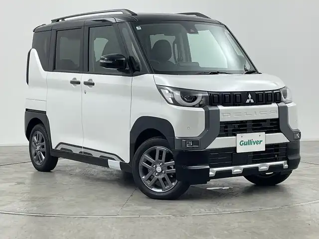 三菱 デリカミニ T プレミアム 群馬県 2025(令7)年 0.1千km アメジストブラック/シルキーホワイト 届出済未使用車 純正9型ディスプレイオーディオ　全周囲カメラ　デジタルインナーミラー　ハンズフリー両側電動スライドドア　ハーフレザー　前席シートヒーター　リヤシーリングファン ルーフレール 禁煙車