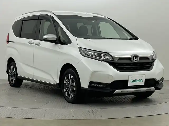 ホンダ フリード クロスター 新潟県 2022(令4)年 3.5万km プラチナホワイトパール ４WD/ホンダセンシング/寒冷地仕様/社外SDナビ　/　　CD/DVD/AM/FM/SD/フルセグ/Bluetooth/バックモニター/両側パワースライドドア/アダプティブクルーズコントロール/LEDオートライト/前席シートヒーター/ハーフレザーシート/純正15インチアルミホイール付/前後ドライブレコーダー/リアサンシェード/アイドリングストップ/純正フロアマット/ドアバイザー/スペアキー/スマートキー