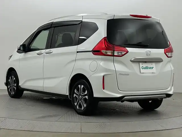 ホンダ フリード クロスター 新潟県 2022(令4)年 3.5万km プラチナホワイトパール ４WD/ホンダセンシング/寒冷地仕様/社外SDナビ　/　　CD/DVD/AM/FM/SD/フルセグ/Bluetooth/バックモニター/両側パワースライドドア/アダプティブクルーズコントロール/LEDオートライト/前席シートヒーター/ハーフレザーシート/純正15インチアルミホイール付/前後ドライブレコーダー/リアサンシェード/アイドリングストップ/純正フロアマット/ドアバイザー/スペアキー/スマートキー