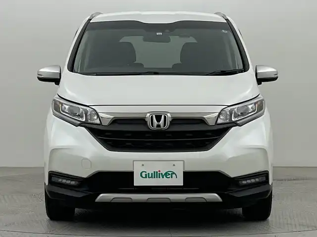 ホンダ フリード クロスター 新潟県 2022(令4)年 3.5万km プラチナホワイトパール ４WD/ホンダセンシング/寒冷地仕様/社外SDナビ　/　　CD/DVD/AM/FM/SD/フルセグ/Bluetooth/バックモニター/両側パワースライドドア/アダプティブクルーズコントロール/LEDオートライト/前席シートヒーター/ハーフレザーシート/純正15インチアルミホイール付/前後ドライブレコーダー/リアサンシェード/アイドリングストップ/純正フロアマット/ドアバイザー/スペアキー/スマートキー