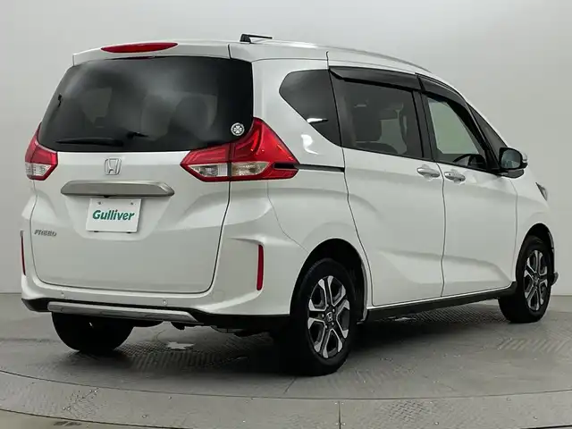 ホンダ フリード クロスター 新潟県 2022(令4)年 3.5万km プラチナホワイトパール ４WD/ホンダセンシング/寒冷地仕様/社外SDナビ　/　　CD/DVD/AM/FM/SD/フルセグ/Bluetooth/バックモニター/両側パワースライドドア/アダプティブクルーズコントロール/LEDオートライト/前席シートヒーター/ハーフレザーシート/純正15インチアルミホイール付/前後ドライブレコーダー/リアサンシェード/アイドリングストップ/純正フロアマット/ドアバイザー/スペアキー/スマートキー
