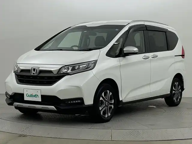 ホンダ フリード クロスター 新潟県 2022(令4)年 3.5万km プラチナホワイトパール ４WD/ホンダセンシング/寒冷地仕様/社外SDナビ　/　　CD/DVD/AM/FM/SD/フルセグ/Bluetooth/バックモニター/両側パワースライドドア/アダプティブクルーズコントロール/LEDオートライト/前席シートヒーター/ハーフレザーシート/純正15インチアルミホイール付/前後ドライブレコーダー/リアサンシェード/アイドリングストップ/純正フロアマット/ドアバイザー/スペアキー/スマートキー