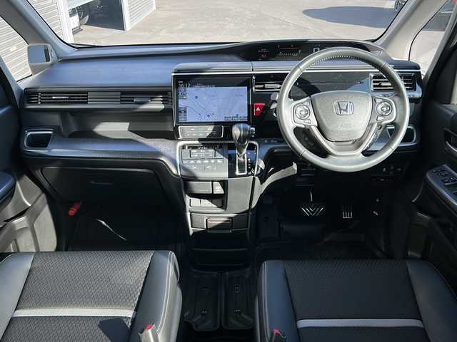 ホンダ ステップワゴン スパーダ クルスピセンシング 道北・旭川 2018(平30)年 3.8万km モダンスティールM ・４ＷＤターボ/・禁煙車/・両側パワースライドドア/・１０インチ純正ナビ/　ＣＤ/ＤＶＤ/ＳＤ/フルセグ/ＢＴ/・１０インチワイド純正フリップダウンモニター////ホンダセンシング////　アダプティブ・クルーズ・コントロール/　衝突軽減ブレーキ/　誤発進抑制機能/　歩行者事故低減ステアリング/　路外逸脱抑制機能/　車線維持支援システム/　先行車発進お知らせ機能/　標識認識機能/・バックカメラ/・ステアリングリモコン/・パドルシフト/・純正ドライブレコーダー/・純正１６インチアルミ/・ＬＥＤヘッドライト/・オートライト/・ハーフレザーシート/・前席シートヒーター/・フロントワイパーデアイサー/・ドアミラーヒーター/・新車時保証書、取説/・スペアキー×１/・ＥＴＣ