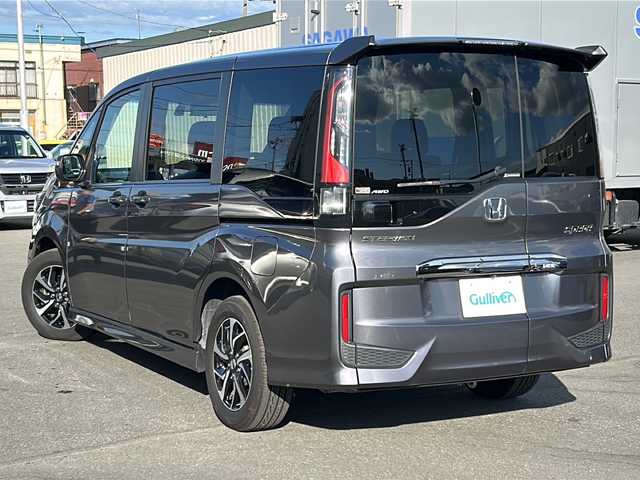 ホンダ ステップワゴン スパーダ クルスピセンシング 道北・旭川 2018(平30)年 3.8万km モダンスティールM ・４ＷＤターボ/・禁煙車/・両側パワースライドドア/・１０インチ純正ナビ/　ＣＤ/ＤＶＤ/ＳＤ/フルセグ/ＢＴ/・１０インチワイド純正フリップダウンモニター////ホンダセンシング////　アダプティブ・クルーズ・コントロール/　衝突軽減ブレーキ/　誤発進抑制機能/　歩行者事故低減ステアリング/　路外逸脱抑制機能/　車線維持支援システム/　先行車発進お知らせ機能/　標識認識機能/・バックカメラ/・ステアリングリモコン/・パドルシフト/・純正ドライブレコーダー/・純正１６インチアルミ/・ＬＥＤヘッドライト/・オートライト/・ハーフレザーシート/・前席シートヒーター/・フロントワイパーデアイサー/・ドアミラーヒーター/・新車時保証書、取説/・スペアキー×１/・ＥＴＣ