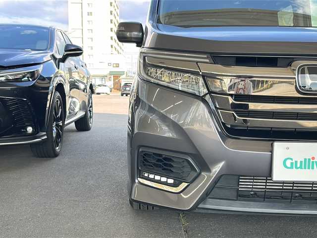 ホンダ ステップワゴン スパーダ クルスピセンシング 道北・旭川 2018(平30)年 3.8万km モダンスティールM ・４ＷＤターボ/・禁煙車/・両側パワースライドドア/・１０インチ純正ナビ/　ＣＤ/ＤＶＤ/ＳＤ/フルセグ/ＢＴ/・１０インチワイド純正フリップダウンモニター////ホンダセンシング////　アダプティブ・クルーズ・コントロール/　衝突軽減ブレーキ/　誤発進抑制機能/　歩行者事故低減ステアリング/　路外逸脱抑制機能/　車線維持支援システム/　先行車発進お知らせ機能/　標識認識機能/・バックカメラ/・ステアリングリモコン/・パドルシフト/・純正ドライブレコーダー/・純正１６インチアルミ/・ＬＥＤヘッドライト/・オートライト/・ハーフレザーシート/・前席シートヒーター/・フロントワイパーデアイサー/・ドアミラーヒーター/・新車時保証書、取説/・スペアキー×１/・ＥＴＣ