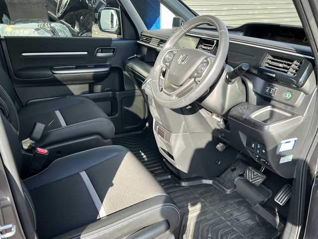 ホンダ ステップワゴン スパーダ クルスピセンシング 道北・旭川 2018(平30)年 3.8万km モダンスティールM ・４ＷＤターボ/・禁煙車/・両側パワースライドドア/・１０インチ純正ナビ/　ＣＤ/ＤＶＤ/ＳＤ/フルセグ/ＢＴ/・１０インチワイド純正フリップダウンモニター////ホンダセンシング////　アダプティブ・クルーズ・コントロール/　衝突軽減ブレーキ/　誤発進抑制機能/　歩行者事故低減ステアリング/　路外逸脱抑制機能/　車線維持支援システム/　先行車発進お知らせ機能/　標識認識機能/・バックカメラ/・ステアリングリモコン/・パドルシフト/・純正ドライブレコーダー/・純正１６インチアルミ/・ＬＥＤヘッドライト/・オートライト/・ハーフレザーシート/・前席シートヒーター/・フロントワイパーデアイサー/・ドアミラーヒーター/・新車時保証書、取説/・スペアキー×１/・ＥＴＣ