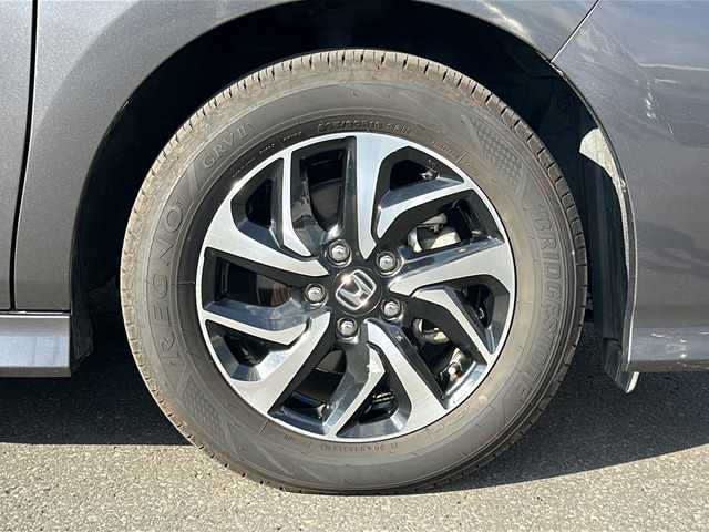 ホンダ ステップワゴン スパーダ クルスピセンシング 道北・旭川 2018(平30)年 3.8万km モダンスティールM ・４ＷＤターボ/・禁煙車/・両側パワースライドドア/・１０インチ純正ナビ/　ＣＤ/ＤＶＤ/ＳＤ/フルセグ/ＢＴ/・１０インチワイド純正フリップダウンモニター////ホンダセンシング////　アダプティブ・クルーズ・コントロール/　衝突軽減ブレーキ/　誤発進抑制機能/　歩行者事故低減ステアリング/　路外逸脱抑制機能/　車線維持支援システム/　先行車発進お知らせ機能/　標識認識機能/・バックカメラ/・ステアリングリモコン/・パドルシフト/・純正ドライブレコーダー/・純正１６インチアルミ/・ＬＥＤヘッドライト/・オートライト/・ハーフレザーシート/・前席シートヒーター/・フロントワイパーデアイサー/・ドアミラーヒーター/・新車時保証書、取説/・スペアキー×１/・ＥＴＣ