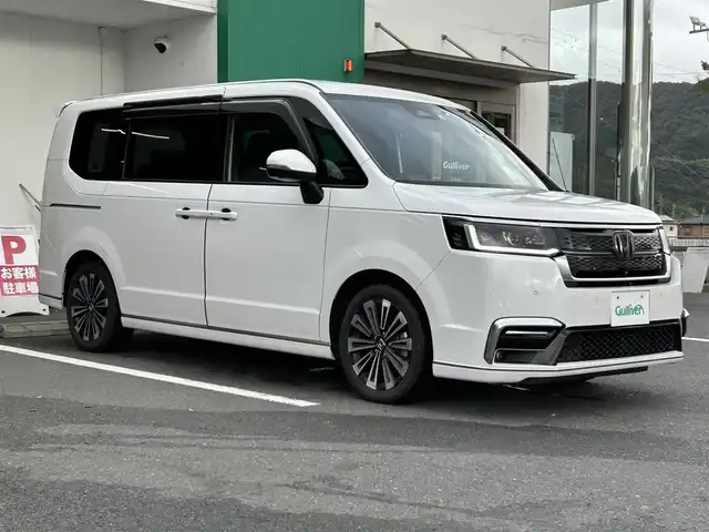 ホンダ ステップワゴン スパーダ eHEV プレミアムライン 京都府 2022(令4)年 4.7万km プラチナホワイトパール 純正９型インチナビ/フルセグ/Bluetooth/全方位カメラ　/両側電動スライド　/ホンダセンシング　　/禁煙車　/７人乗り　/クリアランスソナー　/ブラインドスポットモニター　/ＬＥＤヘッドライト　/シートヒーター　/ドライブレコーダー/ETC/プッシュスタート