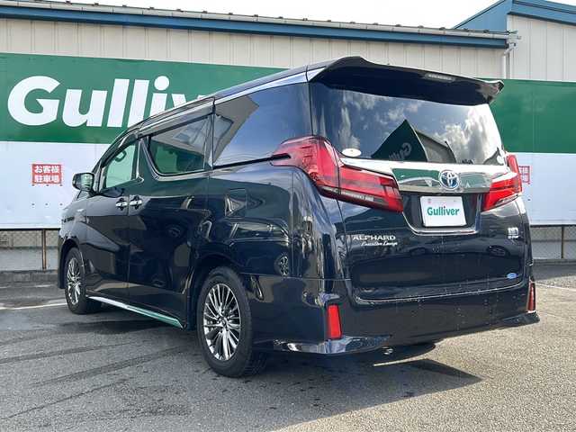 トヨタ アルファードハイブリット エグゼクティブ ラウンジ S 福島県 2021(令3)年 1.4万km スパークリングブラックパールクリスタルシャイン トヨタセーフティセンス/・衝突被害軽減ブレーキ/・オートハイビーム/・車線逸脱警報装置/・レーダークルーズコントロール/・ロードサインアシスト/・プロアクティブドライビングアシスト/純正ディスプレイオーディオナビ/・JBLサウンド/・フルセグTV/BT/CD/DVD/SD/USB/HDMI/・MiraCast/FM/AM/・バックカメラ/・アラウンドビューモニター/・ビルトインETC2.0/・純正フリップダウンモニター/前後ドライブレコーダー/・型番：DC-DR651/革張りステアリング/・ステアリングスイッチ/・ステアリングヒーター/レザーシート/・全席パワーシート/・全席シートヒーター/・全席エアシート/・オットマン/・3列シート/・D席メモリーシート/両側パワースライドドア/電動リアゲート/電子パーキング/・オートブレーキホールド/100V電源/MTモード付AT/プッシュスタート/・スマートキー/・スペアキー1本/LEDヘッドライト/・オートライト/・フォグランプ/コーナーセンサー/ワンオーナー/純正ドアバイザー/純正フロアマット/積込みスタッドレスタイヤ/・ECOFORMEアルミ/・溝10mm/・225/60R16
