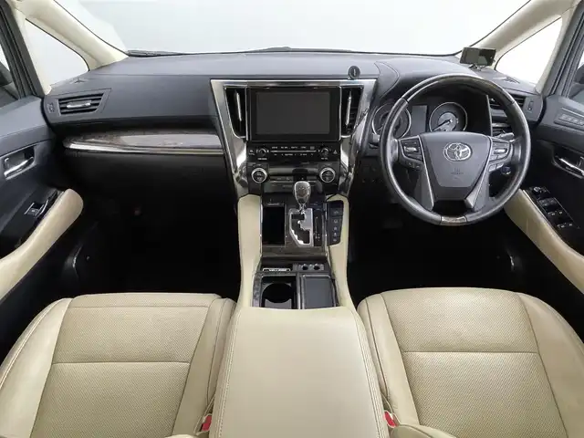 トヨタ ヴェルファイア ハイブリット エグゼクティブ ラウンジ 道央・札幌 2018(平30)年 11.1万km ホワイトパールクリスタルシャイン ・４WD/・寒冷地仕様/・モデリスタエアロ（F・S・R）/・JBLサウンド/・純正メーカーナビ/　CD／DVD／BT／フルセグ/・パノラミックビューモニター/・純正フリップダウンモニター/・デジタルインナーミラー/・純正ビルトインETC2.0/・社外ドライブレコーダー/・両側パワースライドドア/・トヨタセーフティセンス/・プリクラッシュセーフティ/・オートマチックハイビーム/・レーンキープアシスト/・レーントレーシングアシスト/・リヤクロストラフィックアラート/・パーキングサポートブレーキ/・ロードサインアシスト/・アダプティブフロントライティングシステム/・前後コーナーセンサー/・ベージュレザーシート/・全席シートヒーター/・全席シーエアコン/・全席パワーシート/・運転席シートメモリー/・純正AW17インチ/・LEDヘッドライト/・フォグライト/・純正フロアマット/・ドアバイザー/・スマートキー/・プッシュスタート/・スペアキー/・取扱説明書