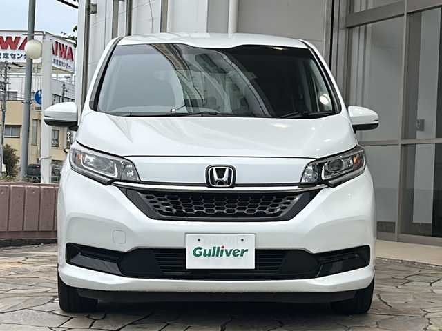 ホンダ フリード ハイブリット G ホンダセンシング 静岡県 2020(令2)年 5.9万km プラチナホワイトパール 社外ナビ/・Bluetooth/・CD/DVD/・ワンセグTV/・USB/・SD/主要装備/・プッシュスタート/・両側パワースライドドア/・ETC車載器/・前席シートヒーター/・コーナーセンサー/・純正フロアマット/・オートライト/・LEDヘッドライト/・後席サンシェード/ホンダセンシング/・衝突軽減ブレーキ/・車線維持支援システム/・アダプティブクルーズコントロール/・誤発進抑制機能/・歩行者事故低減ステアリング/・路外逸脱抑制機能/・先行車発進お知らせ機能/・標識認識機能