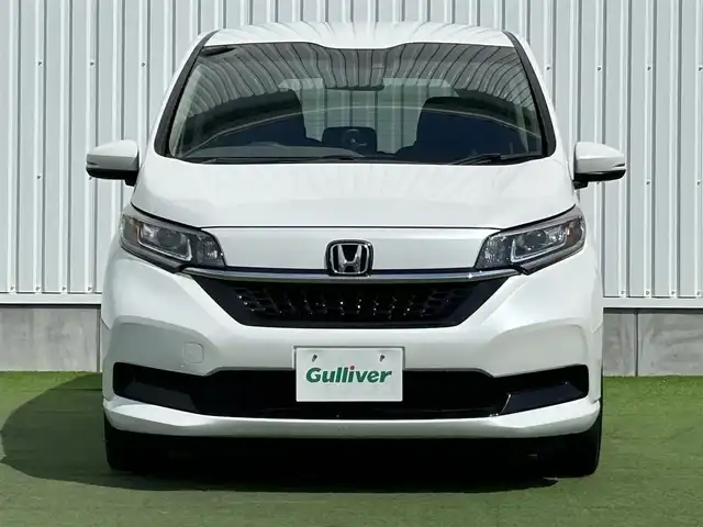 ホンダ フリード ハイブリット G ホンダセンシング 香川県 2020(令2)年 5.9万km プラチナホワイトパール 社外ナビ/・Bluetooth/・CD/DVD/・ワンセグTV/・USB/・SD/主要装備/・プッシュスタート/・両側パワースライドドア/・ETC車載器/・前席シートヒーター/・コーナーセンサー/・純正フロアマット/・オートライト/・LEDヘッドライト/・後席サンシェード/ホンダセンシング/・衝突軽減ブレーキ/・車線維持支援システム/・アダプティブクルーズコントロール/・誤発進抑制機能/・歩行者事故低減ステアリング/・路外逸脱抑制機能/・先行車発進お知らせ機能/・標識認識機能