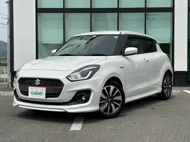 スズキ スイフト HYBRID RS 和歌山県 2018(平30)年 2.4万km ピュアホワイトP 社外ナビ/Bluetooth/フルセグTV/バックカメラ/プリクラッシュセーフティ/レーンキープアシスト/横滑り防止装置/レーダークルーズコントロール/本革ステアリング/LEDヘッドライト/オートライト/フォグランプ/前後ドライブレコーダー/純正16インチアルミホイール/ビルトインETC/シートヒーター（ドライブ席）/パドルシフト/アイドリングストップ/ステリングリモコン/ドアバイザー/純正フロアマット/ウィンカーミラー/プッシュスタート/スマートキー