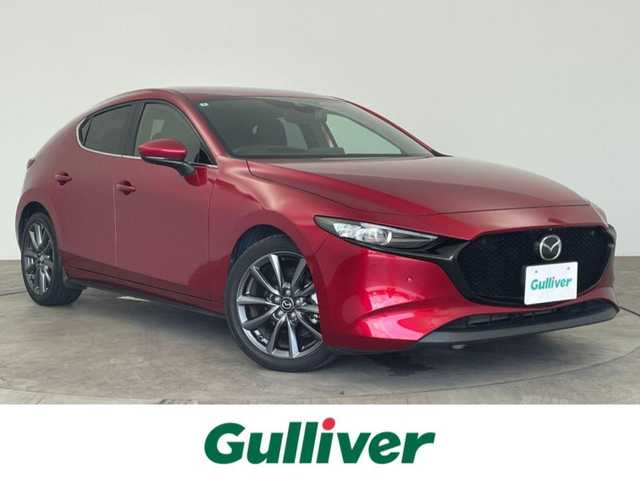 マツダ マツダ３ファストバック 15S ツーリング 大分県 2020(令2)年 3.7万km ソウルレッドクリスタルM 純正SDナビ/フルセグＴＶ/Ｂｌｕｅｔｏｏｔｈ/ＨＤＭＩ/ＢＳＭ/ＨＵＤ　/全方位カメラ/レーダークルーズコントロール/コーナーセンサー/レーンアシスト/前後ドライブレコーダー/革巻ステアリング/HDMI入力端子/ステアリングスイッチ/オートマチックハイビーム/スペアキー/ＥＴＣ/純正アルミホイル18インチ/純正フロアマット