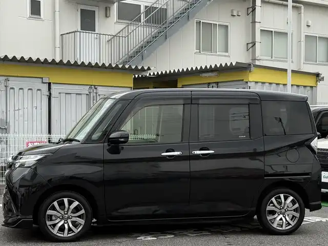 トヨタ タンク カスタムG－T 愛知県 2020(令2)年 1万km ブラックマイカメタリック /ワンオーナー//禁煙車//前後ドライブレコーダー//純正ディーラーオプションSDナビ//CD/DVD/AM/FM/BT/SD//バック/サイド/フロント/全周囲カメラ//パノラミックビューモニター//ビルトインETC//純正エンジンスターター//スマートアシスト//衝突警報機能//衝突回避支援ブレーキ機能//誤発進抑制制御機能//車線逸脱警報機能//先行車発進お知らせ機能//マルチインフォメーションディスプレイ//コーナーセンサー//横滑り防止装置//クルーズコントロール//スポーツスイッチ//アイドリングストップ//両側パワースライドドア//オートリトラクタブルウィンカーミラー//前席シートヒーター(D/N)//オートハイビーム//LEDイルミネーションランプ//ステアリングスイッチ//プッシュスタート//フォグランプ//リモートスタート//純正フロアマット//純正ドアバイザー//取扱説明書//ナビ取扱説明書//保証書//記録簿(R3.R5)