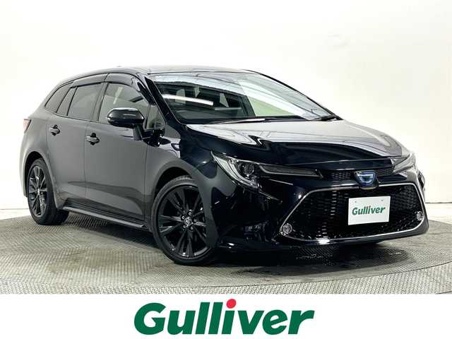 トヨタ カローラツーリング ハイブリッド ダブルバイビー 大阪府 2022(令4)年 2.2万km ブラックマイカ 純正ディスプレイオーディオ バックカメラ ETC ハーフレザー シートヒーター ステアリングヒーター 衝突軽減 レーダークルコン クリアランスソナー トヨタセーフティセンス スマートキー
