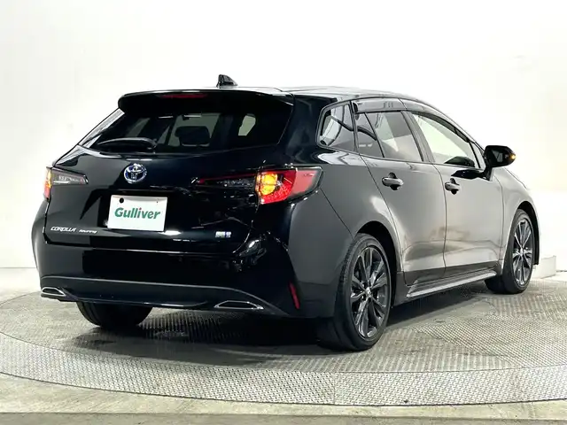 トヨタ カローラツーリング ハイブリッド ダブルバイビー 大阪府 2022(令4)年 2.2万km ブラックマイカ 純正ディスプレイオーディオ バックカメラ ETC ハーフレザー シートヒーター ステアリングヒーター 衝突軽減 レーダークルコン クリアランスソナー トヨタセーフティセンス スマートキー