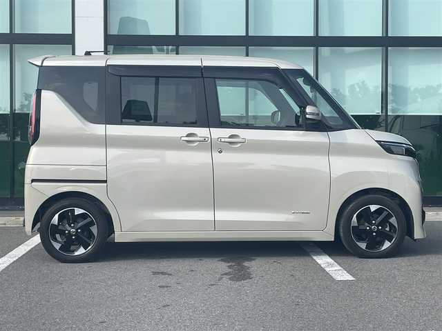 日産 ルークス HWS X プロパイロットED 和歌山県 2022(令4)年 1.7万km フローズンバニラパール 純正9インチナビ（MM321D-V）/フルセグTV/Bluetooth/CD/DVD/USB/全周囲カメラ/ビルトインETC/前後ドライブレコーダー/プロパイロット/衝突軽減カメラ/レーンキープアシスト/レーダークルーズコントロール/コーナーセンサー/両側パワースライドドア/ハンズフリーオートスライド/快適パックA/プラズマクラスター付きリヤシーリングファン/パーソナルテーブル/カップホルダー9個/助手席裏USBソケット/ロールサンシェード/撥水加工シート/電動パーキングブレーキ/オートブレーキホールド/LEDヘッドライト/フォグランプ/オートライト/オートハイビーム/純正14インチAW/ドアバイザー/プッシュスタート/スマートキー